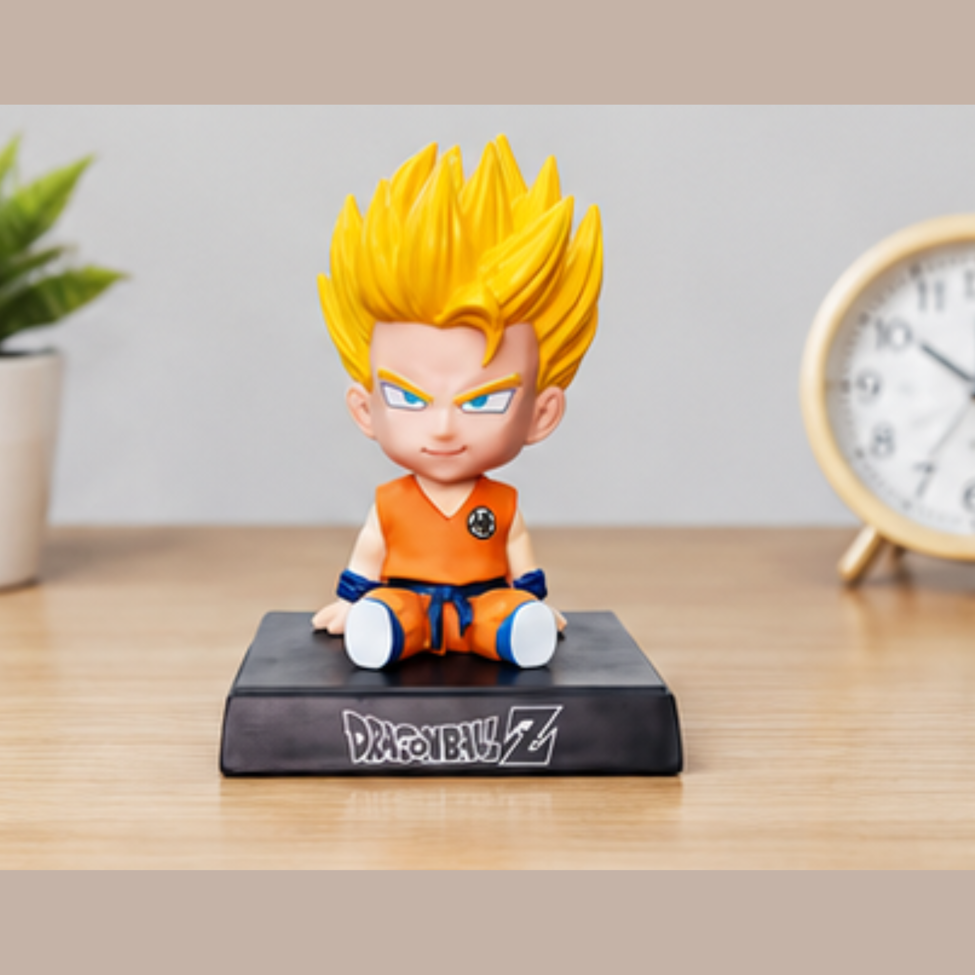 Dragon Ball Z Super Saiyan Goku Chibi Sitting Action Figure | 12 cm Anime Collectible PVC Statue | Desk Decor & Gift for DBZ Fans